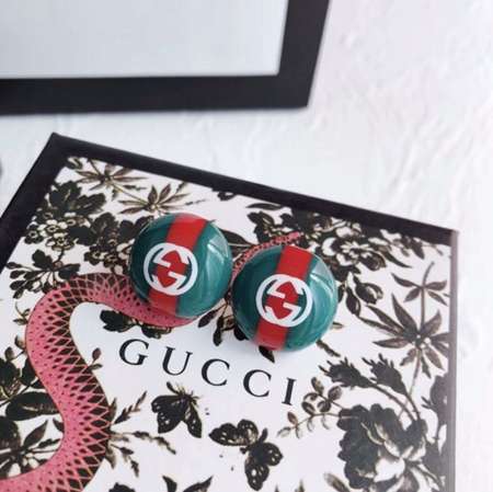 Gucci ボタン形コントラストカラーピアス