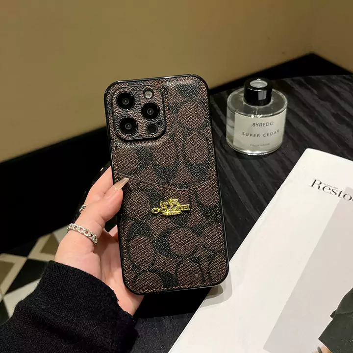 coach iphone15カバー シグネチャー